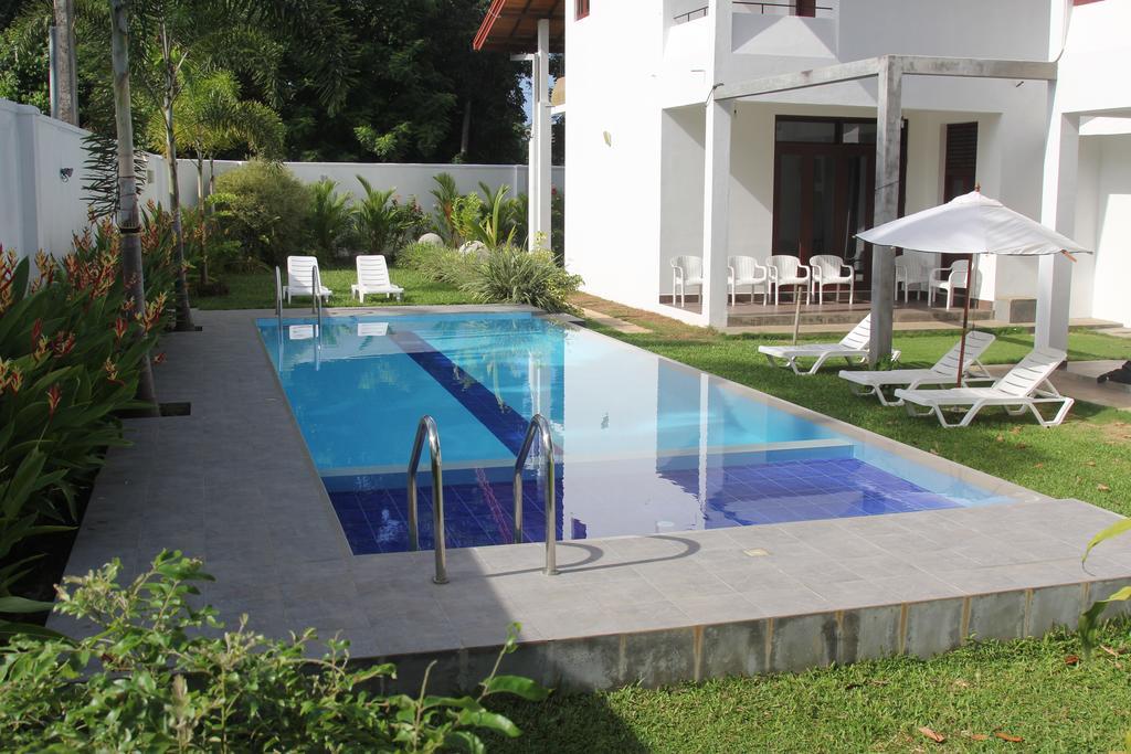 Harris Villa Hikkaduwa Pokoj fotografie