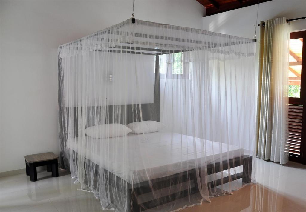 Harris Villa Hikkaduwa Pokoj fotografie