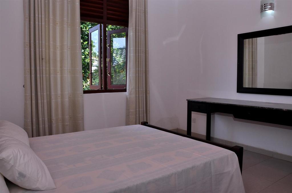 Harris Villa Hikkaduwa Pokoj fotografie