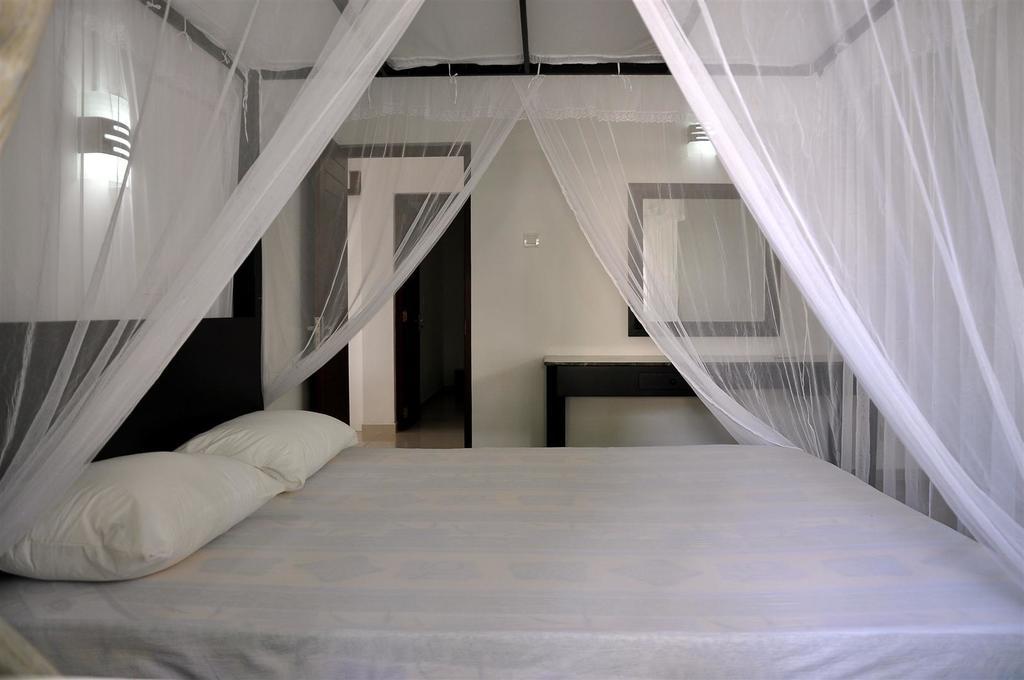 Harris Villa Hikkaduwa Pokoj fotografie