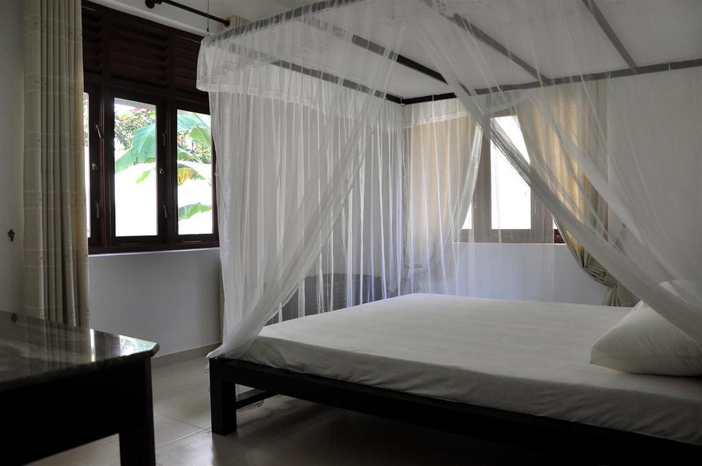 Harris Villa Hikkaduwa Pokoj fotografie