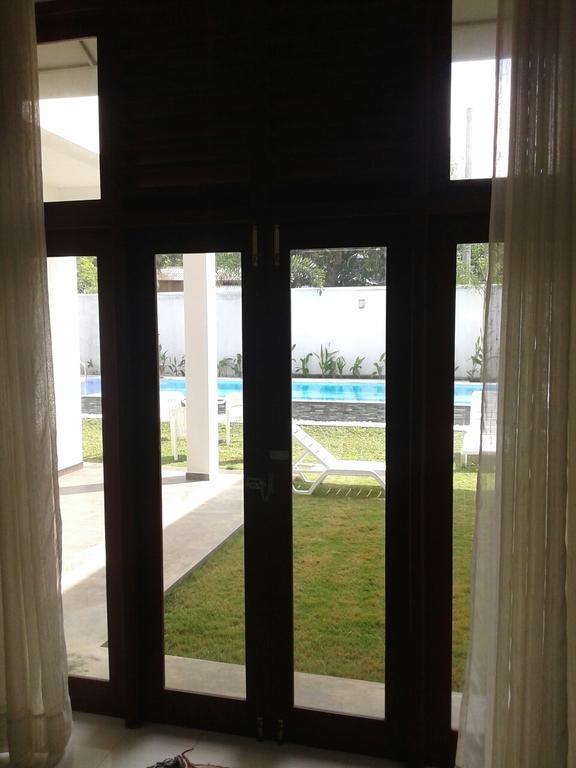 Harris Villa Hikkaduwa Pokoj fotografie