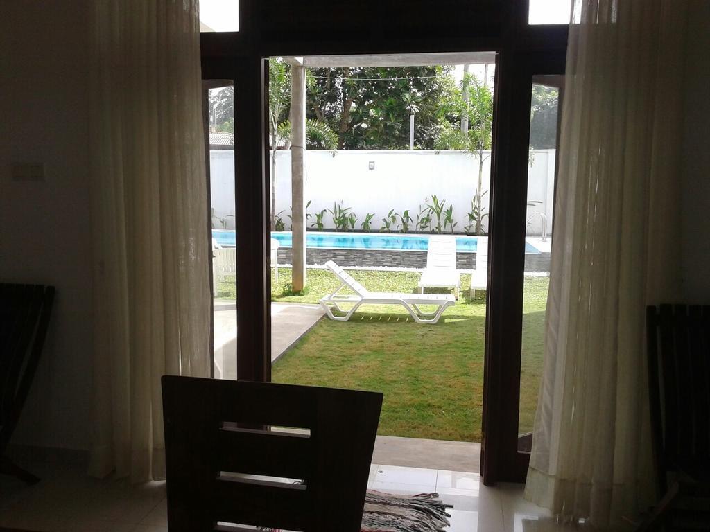 Harris Villa Hikkaduwa Pokoj fotografie