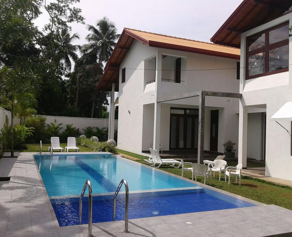 Harris Villa Hikkaduwa Pokoj fotografie