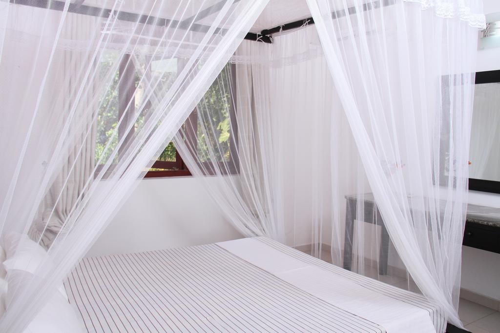 Harris Villa Hikkaduwa Pokoj fotografie